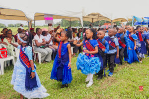 Preschool and graduating students in colorful attire smiling while receiving awards at Powerfields Schools, a top school in Ikorodu and Lagos