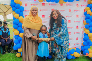 Preschool and graduating students in colorful attire smiling while receiving awards at Powerfields Schools, a top school in Ikorodu and Lagos