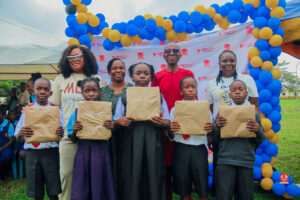 Preschool and graduating students in colorful attire smiling while receiving awards at Powerfields Schools, a top school in Ikorodu and Lagos