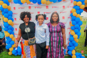Preschool and graduating students in colorful attire smiling while receiving awards at Powerfields Schools, a top school in Ikorodu and Lagos