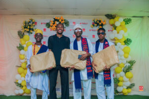 Year 12 graduates in colorful outfits smiling and receiving awards at Powerfields Schools valedictory service, a top boarding school in Lagos